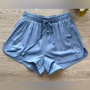 Light Blue Short with pockets drawstring waistband. Brand Heyson